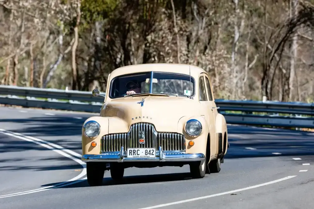 Vintage Holden driving on country roads, Australia