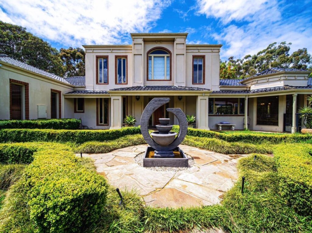 Front view from the fountain at Villa with Pool and Tennis Court