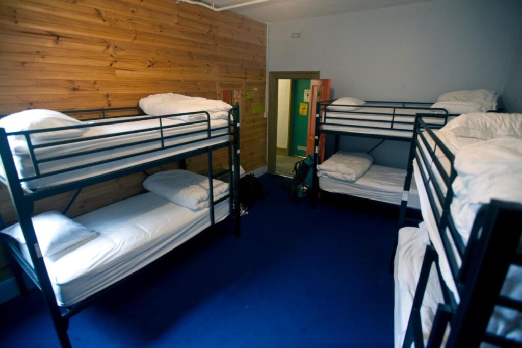 A six deb dormitory with fresh clean sheets at the Backpackers Imperial Hotel