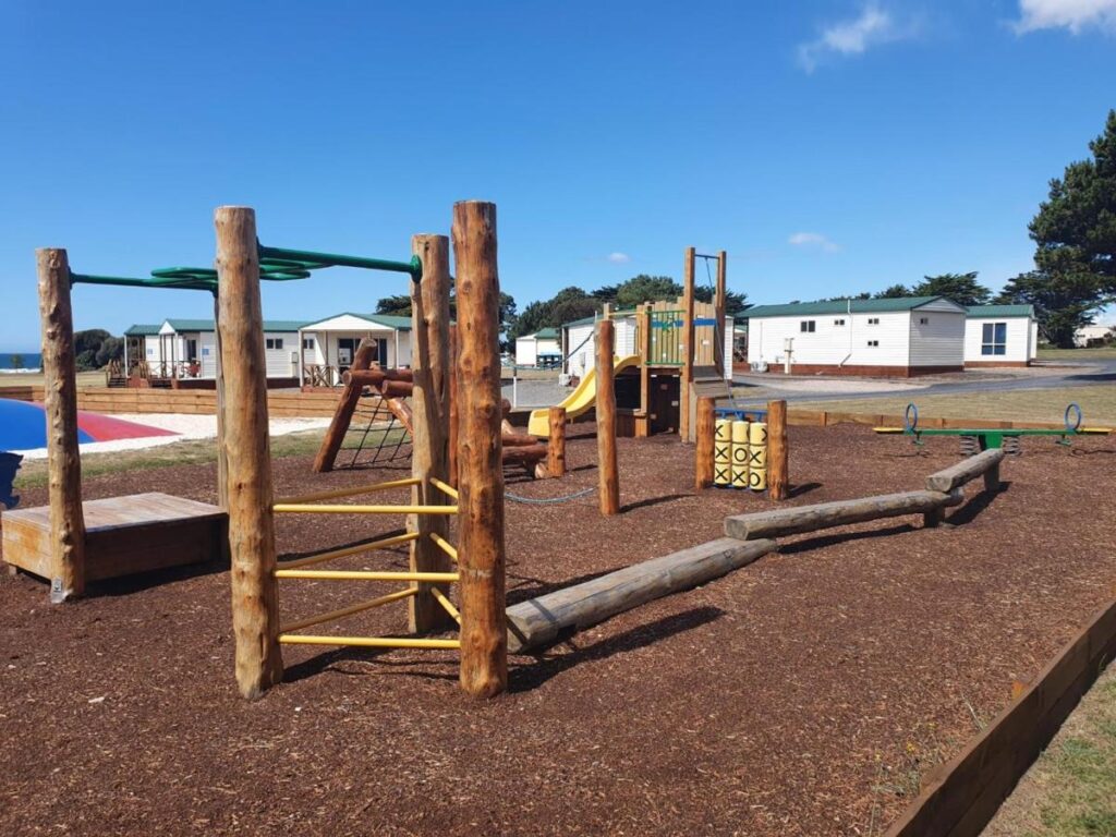 The local park for kids to play with slides and monkey bars at Discovery Parks Devonport.