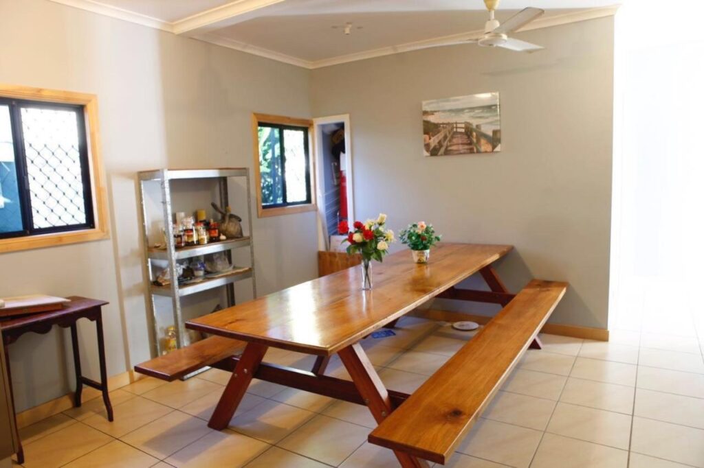 A clean dining room for guests to munch on lunch or dinner at - Happytourcairns Sharehouse