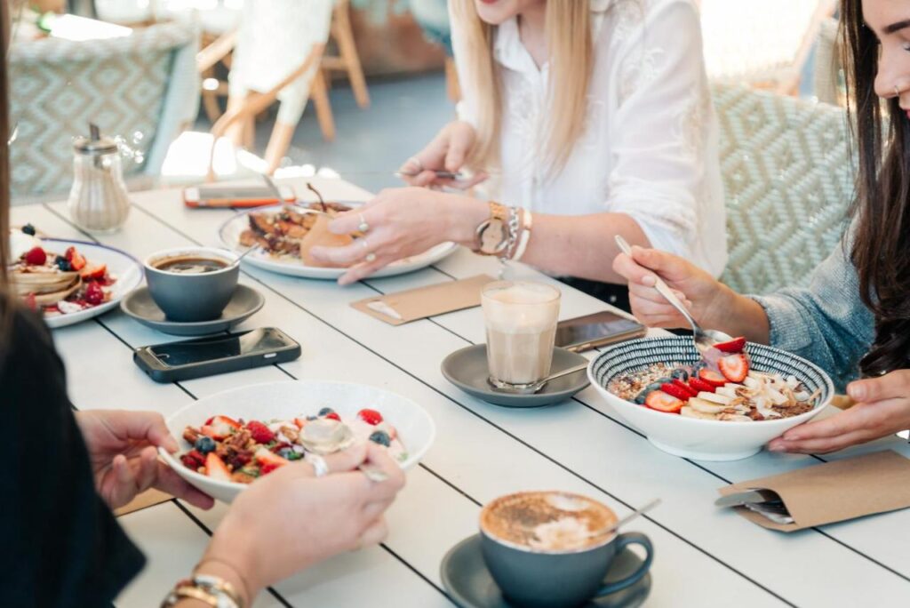 Travellers eating a healthy breakfast in the dining area at Hostel Wake Up! Sydney Central