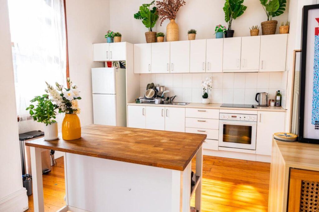 A clean and bright kitchen to cook your lunches and dinners at Surry Stays