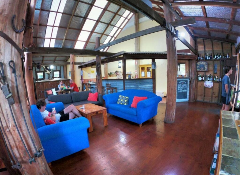 Guest lounge area for relaxig and socialising with travellers at Woolshed Eco Lodge