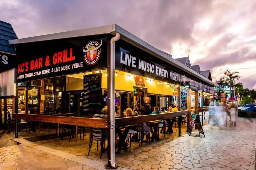 The Bar and Grill with revellers having a drink and some dinner nearby the Accom KC's