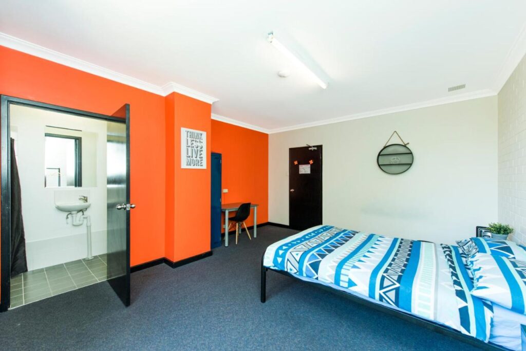 A private room with ensuite and access to a private balcony at Billabong Backpackers Resort