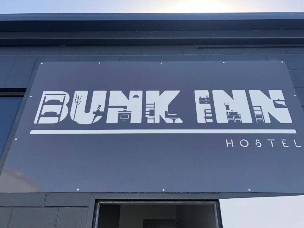 The signage and entrance to the Bunk Inn Hostel