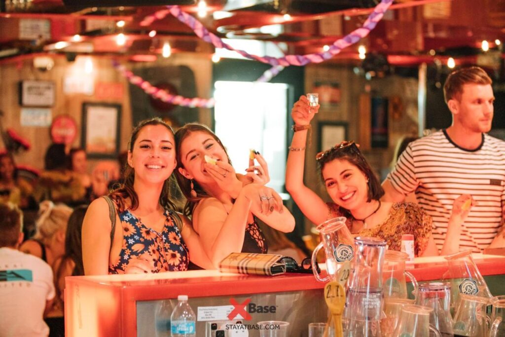 Happy guests at the bar at Nomads St Kilda